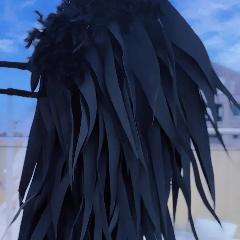 التصوير الفوتوغرافي لدعامة الجناح الأسود لتصوير دعائم الرماية لأداء حفلات الهالوين