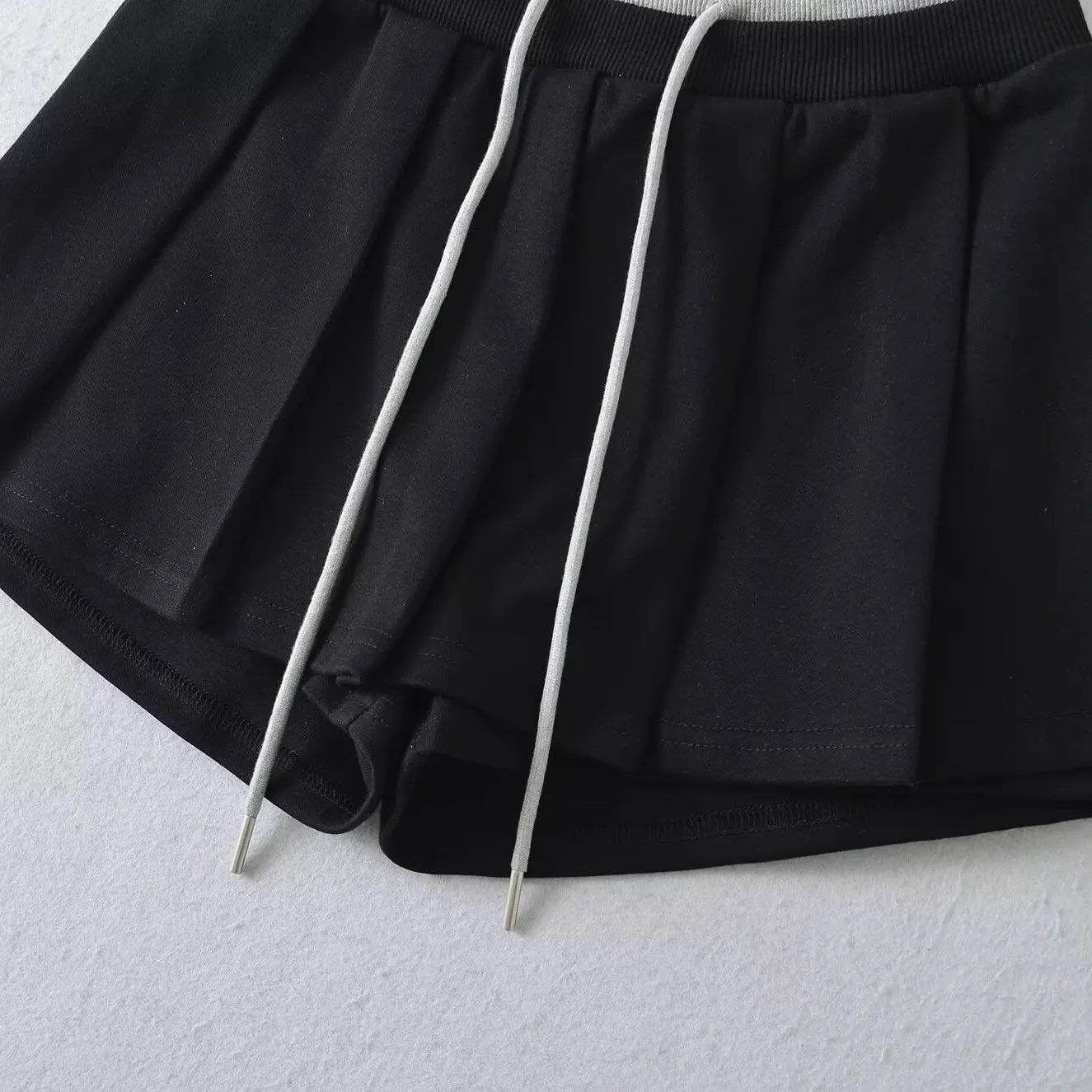 

Miu Sle Color Blo плиссированная юбка с двойной талией и завязками женские летние универсальные противолегкие спортивные юбки трапециевидной формы