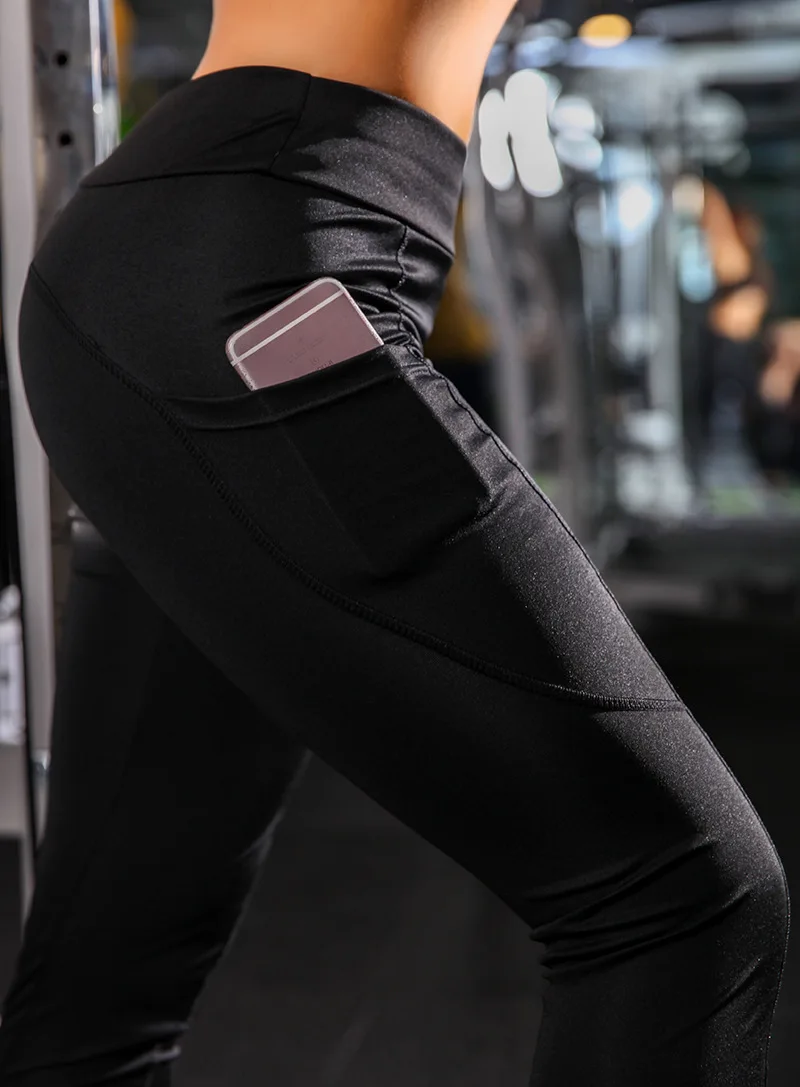 Leggings Fitness in poliestere vendita Leggins da palestra pantaloni da Yoga elastici a vita alta pantaloni sportivi da donna tasche