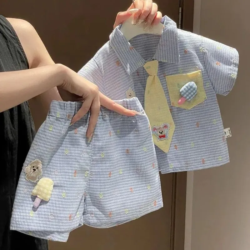 

Boy Baby Summer Set 2025 New Korean Edition Children's Short sleeved Shirt Shorts Two piece Set