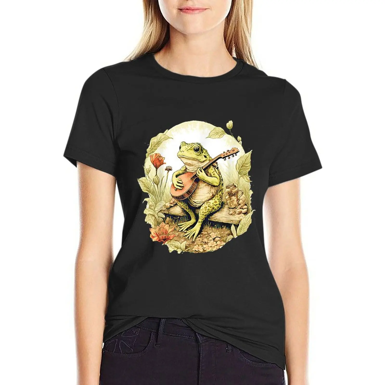 

Frog Playing Banjo On Log, Funny Cottagecore Aesthetic Frog With Musical instrument T-Shirt blacks Women's tops