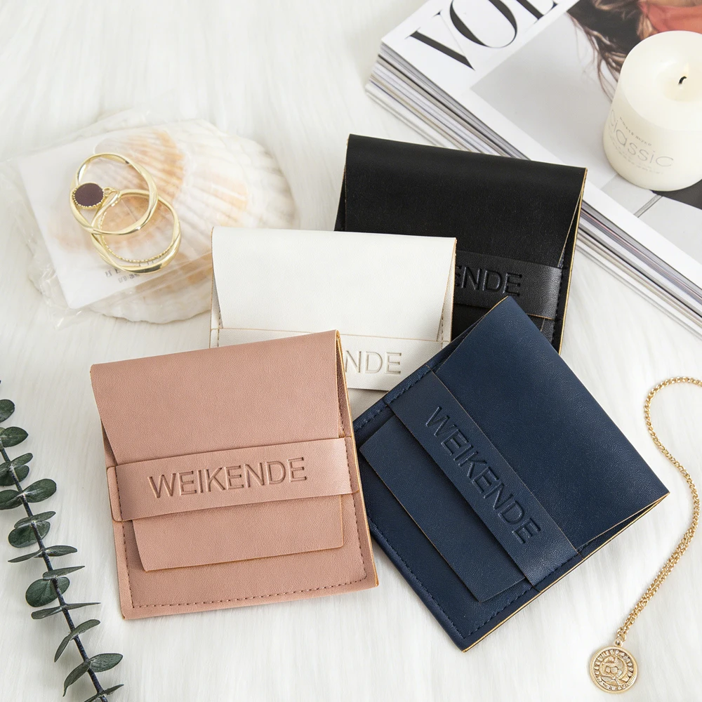 

100 шт./лот, шикарный кожаный логотип из искусственной кожи, сумка для ювелирных изделий, конверт, кольцо из искусственной кожи, серьги, кулон, ожерелье, сумка для хранения свадебных сувениров