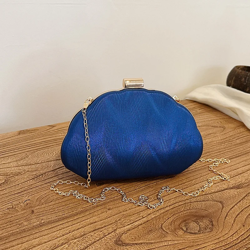 Textured shell  French light luxury dinner  niche design banquet clutch  temperament chain shoulder bag