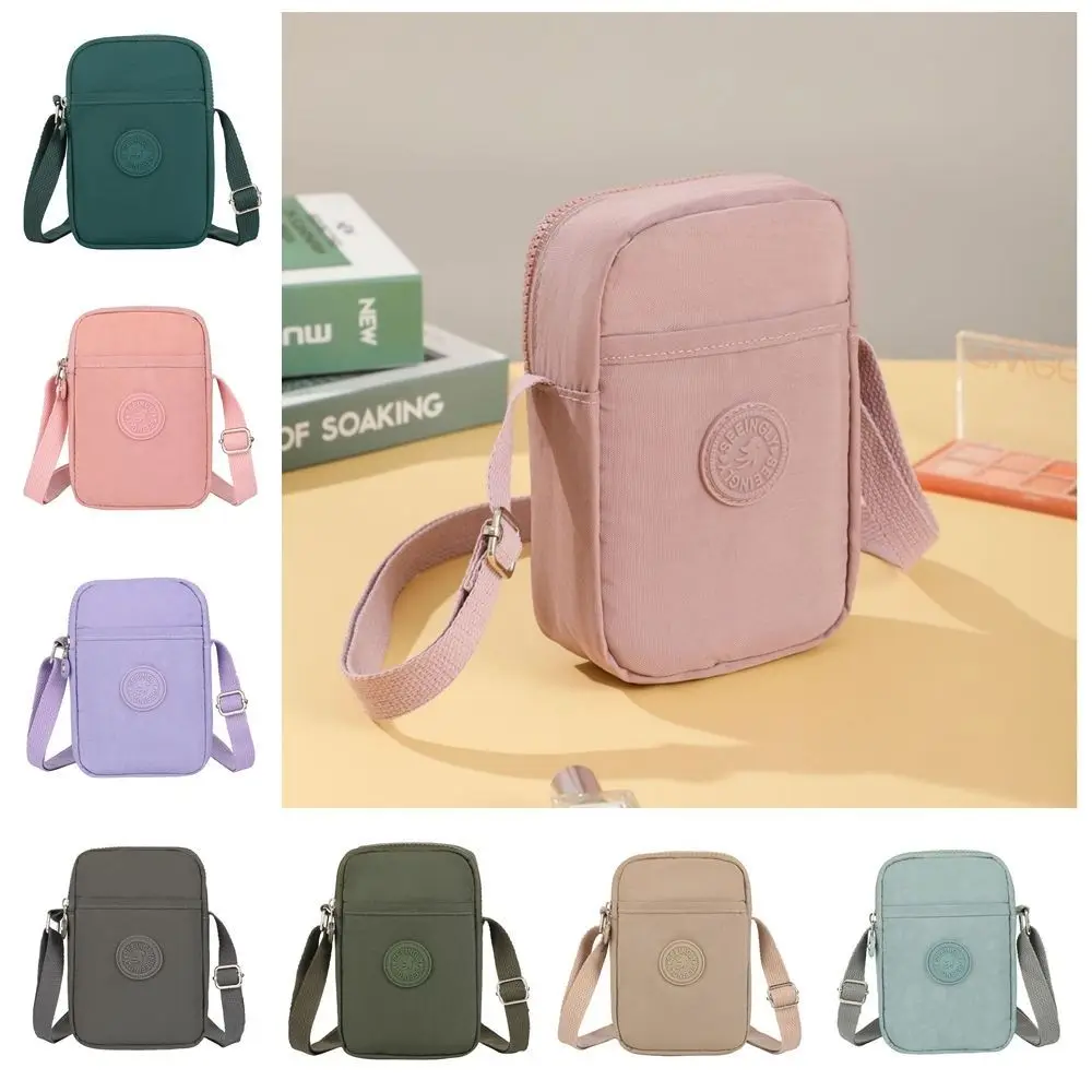 حقيبة كروس محمولة متعددة الوظائف بسحاب بتصميم متخصص حقيبة كتف من النايلون بلون سادة على الطراز الكوري حقيبة هاتف صغيرة للنساء #2