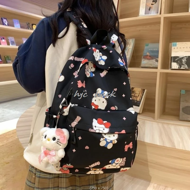 Mochila de Hello Kitty con estampado de dibujos animados para niña, mochila ligera con lazo para estudiantes de escuela media, impermeable, a la moda, regalo para estudiantes