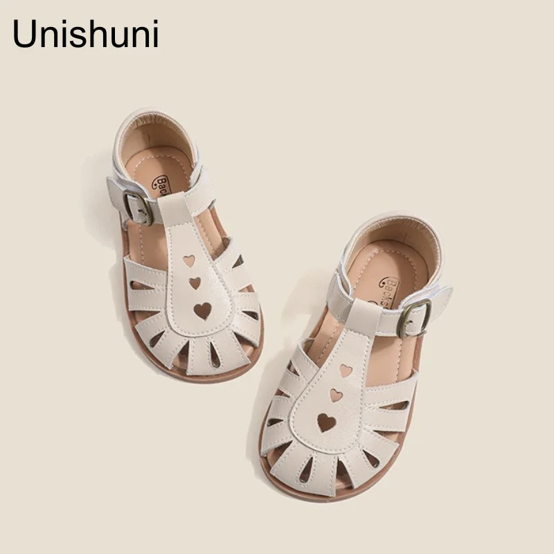 Unishuni Girls Half Sandal Kids scarpe in vera pelle per bambini scava fuori la scarpa primavera estate Design a cuore Retro Princess Flats