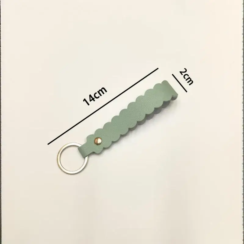 1 Stück Schlüsselanhänger mit gewelltem Lederkanten-Design, mehrfarbig, tragbarer Taschenanhänger für Damen, ideal als Geschenk für den täglichen Gebrauch. – Detail 8