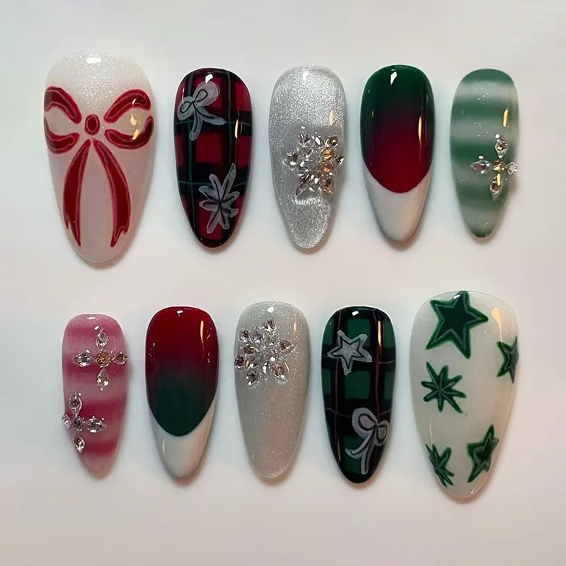 24 Uñas Postizas Color Fucsia con Lazos, Estrellas Blancas/Plateadas/Verdes, Copos de Nieve de Cristal y Brillo, Forma Almendrada Larga, Tamaños Surtidos