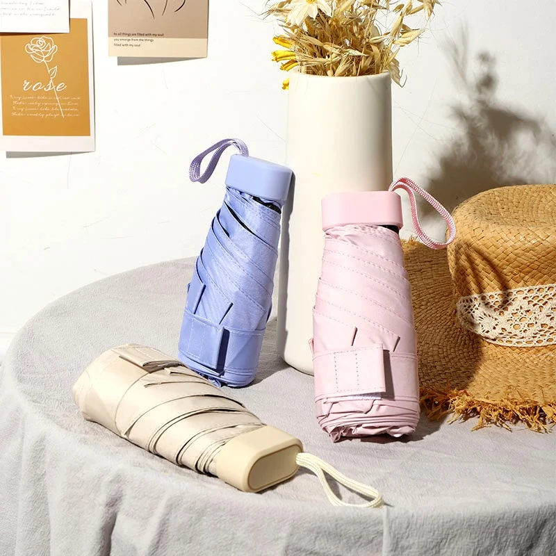 Mini-Regenschirm, Kapselschirm, sonniger und regnerischer Dual-Use-Regenschutz, Sonnenschutz, Outdoor-Reisen, tragbarer Sonnenschirm