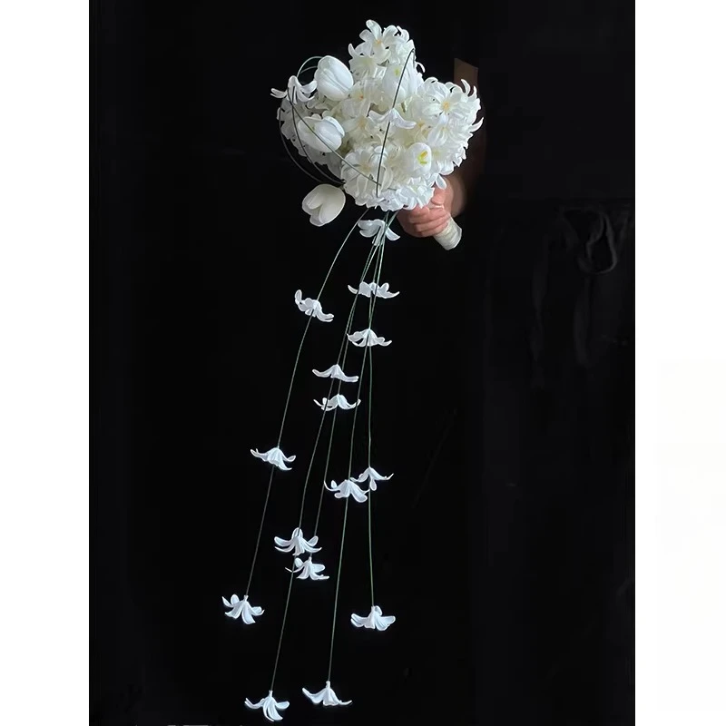 

High-end fresh Mori waterfall bouquet, simulated fake bouquet, outdoor bridal wedding dress shooting props