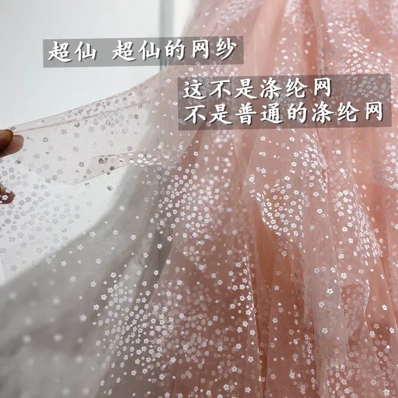 New  well in excess of the fairy of cherry blossoms in the irregular long skirts and fine mesh winter veil