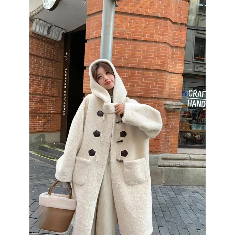 A New Winter Style of Knee-length Faux Lambskin Hooded Coat with Horn Buttons, A Versatile Loose and Thick Outerwear for Women.