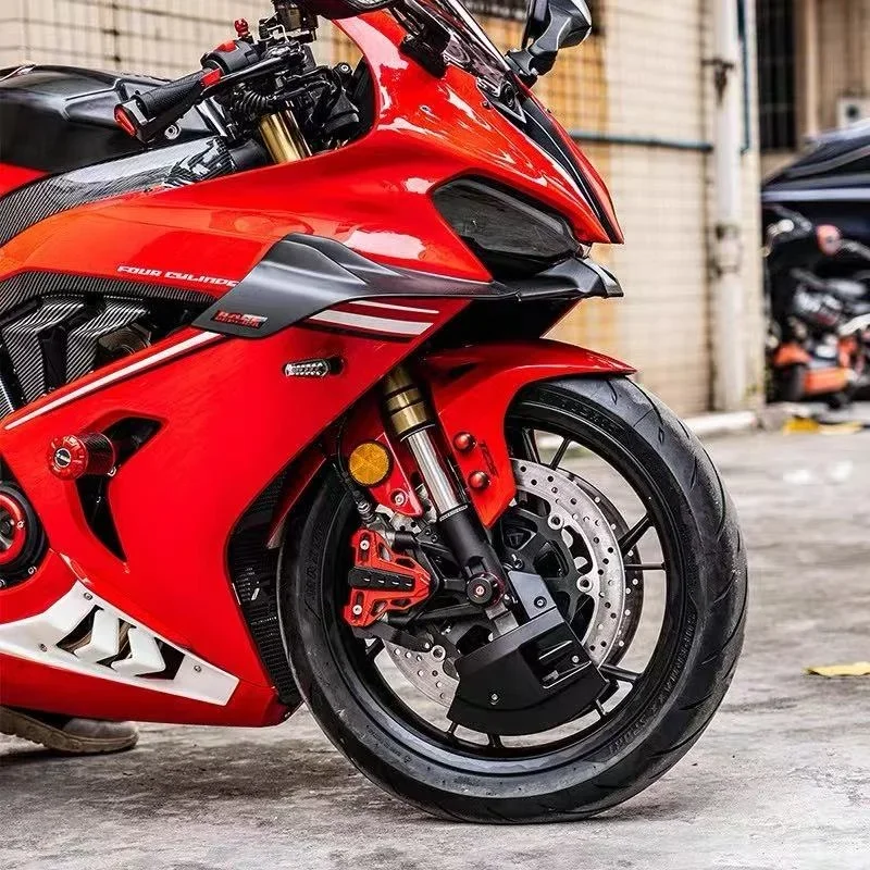 Front brake disc fairing and bumper modification for QJMOTOR SRV 600, SRV500S, SRV700, 550, 600, and 700 models.