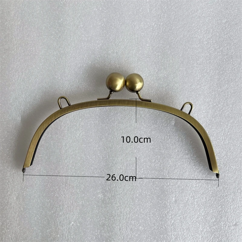 26.0*10.0cm Antique Brass Big Ball Claps Screws With Loops Metal Purse Frame Wholesale Handbag Accessories Obag Parts Handles