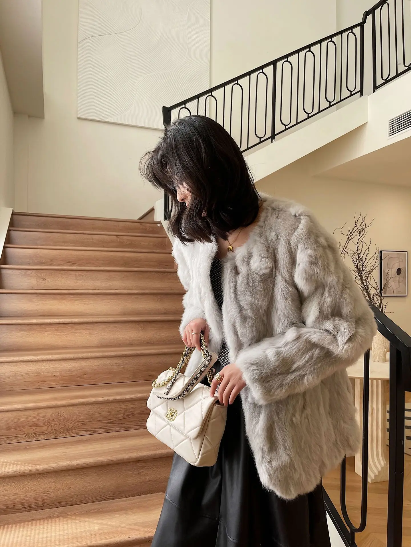 Winter Fashion and Warm Fur Integrated Rabbit Hair Mid length Coat for Women