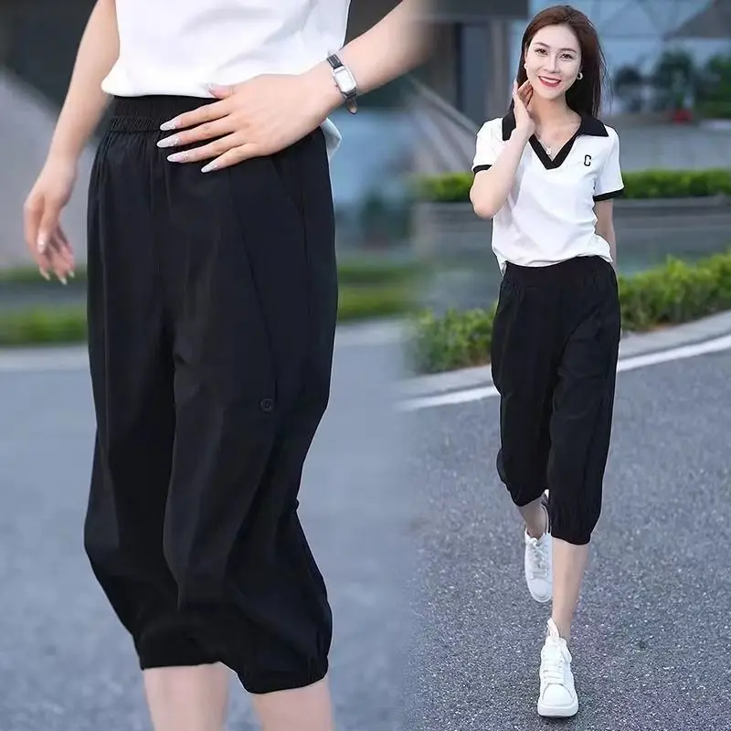 Pantaloni casual con protezione solare per le donne in estate sottile 2025 Nuovo stile semplice pantaloni a 5 punti con rilegatura alla caviglia Pantaloni da lavoro