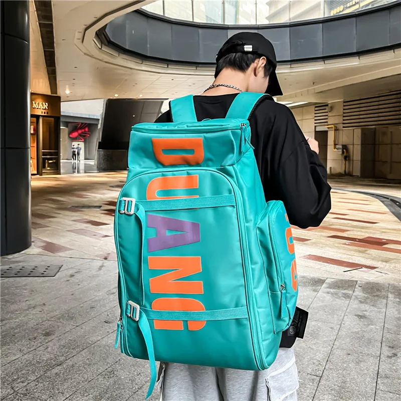 Schoolbag cool large capacity backpack mountaineering travel backpack skateboard veneer men's bag dry wet separation fitness bag