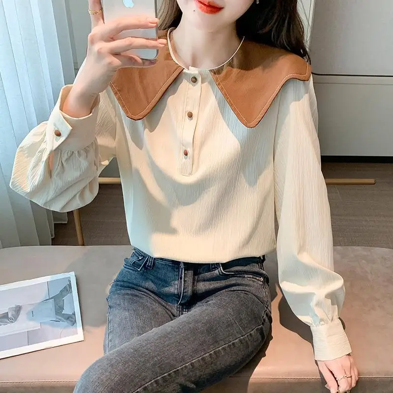 เสื้อเชิ้ตแขนยาวผู้หญิง แต่งระบาย กระดุมผ่าหน้า ชายเสื้อจีบ แขนทรงโคมไฟ สไตล์พรีปปี้ มินิมอล อ่อนหวาน สง่างาม ชุดฤดูใบไม้ผลิ