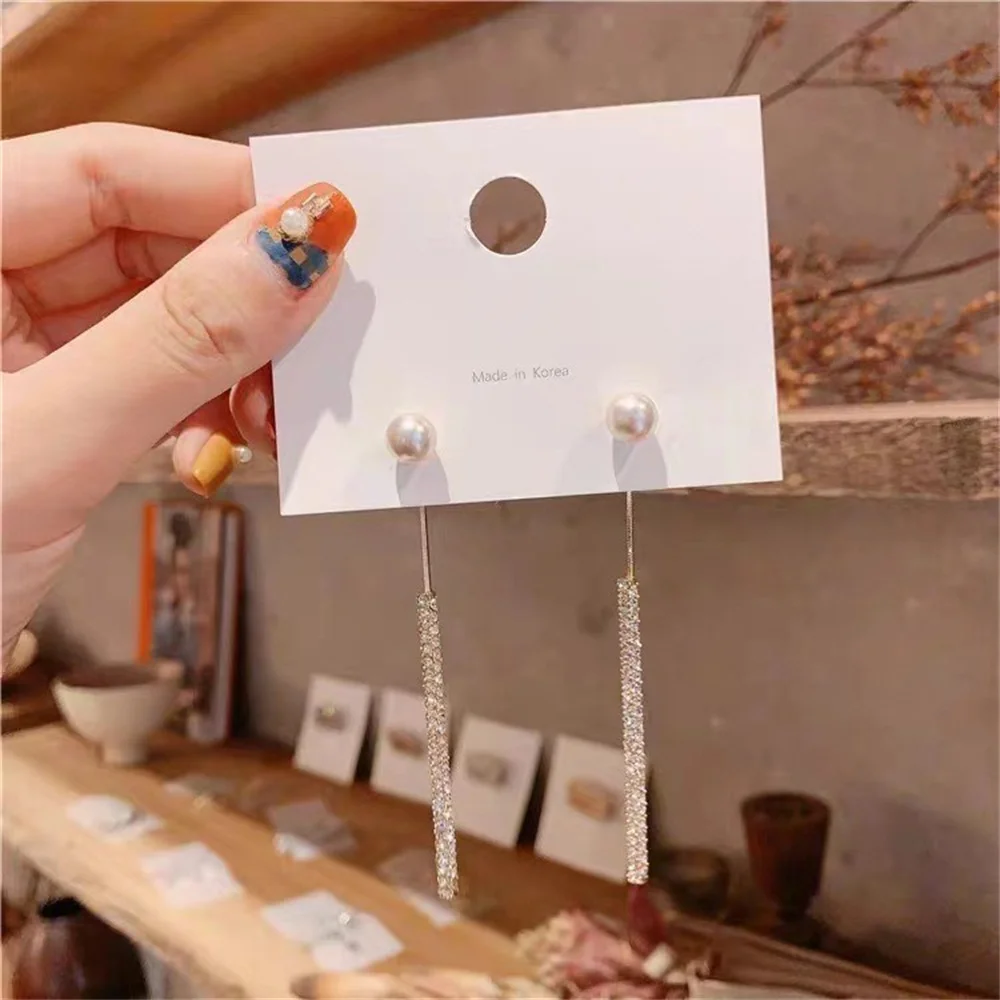 Design inspired earrings with full diamond tassel earrings for women, light luxury, slimming face, exquisite pearl earrings