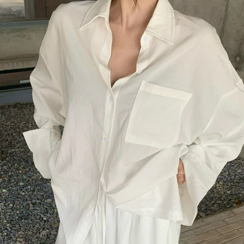 Temperamento blanco Polo Collar camisa Top Slack traje ropa de mujer moda de verano Casual pantalones de pierna ancha conjunto de dos piezas 2025