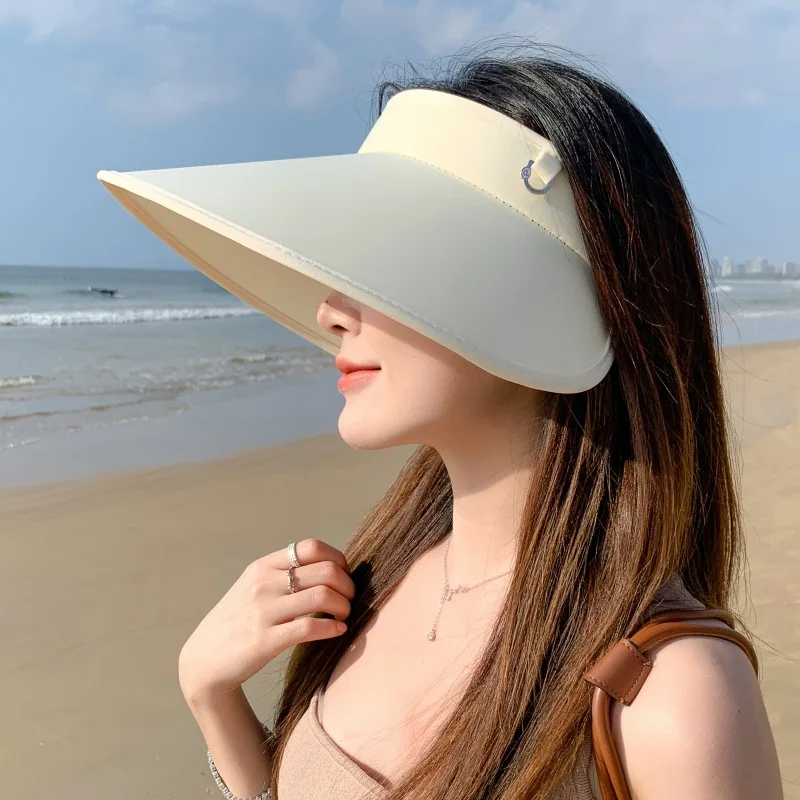 

New summer women's anti-ultraviolet hollow top hat, outdoor windproof sun hat Korean version, outing ice silk large brim sun hat