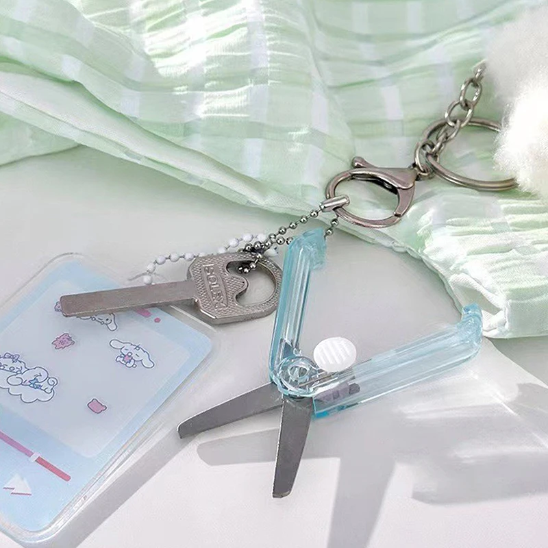 Mini forbici piccole trasparenti Color caramella pieghevoli forbici telescopiche per cancelleria con ciondolo sicurezza Scrapbook forbici studente