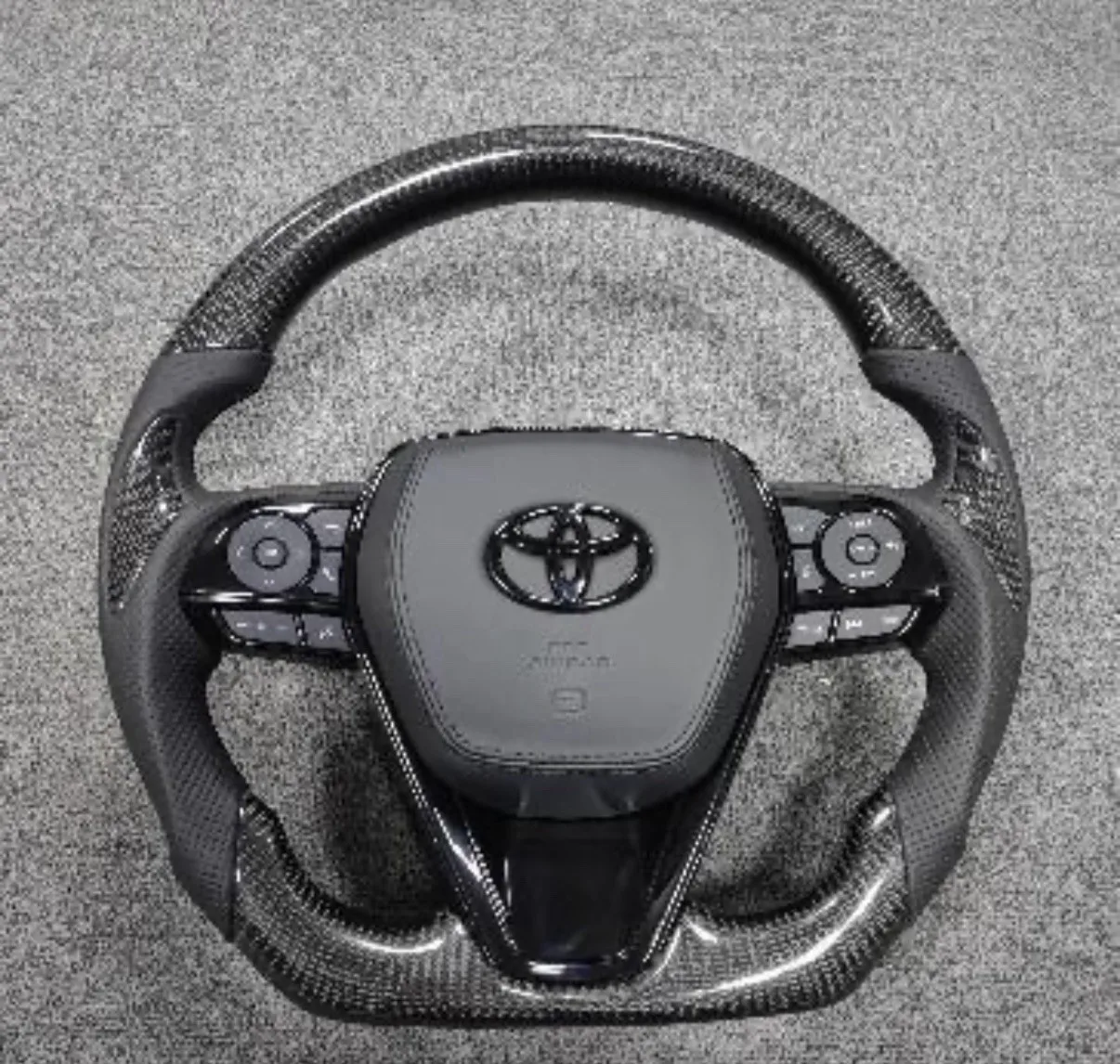 

РУЛЬЫ ДЛЯ TOYOTA CAMRY 8-ГО ПОКОЛЕНИЯ, AVALON, ИЗ УГЛЕРОДНОГО ВОЛОКНА, КОЖИ И ДР.