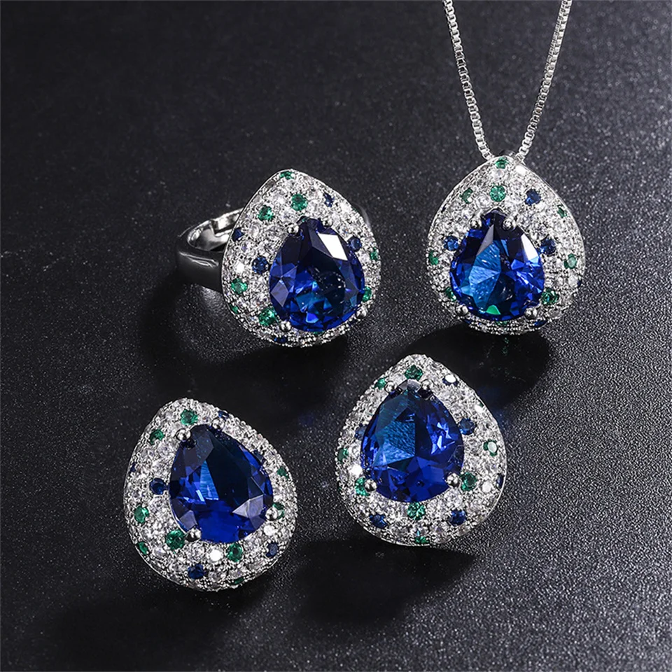 

Blue Glass Teardrop-shaped Ring Earring Pendant Jewelry Set 10*12 Niche Personalized Wide-edge Diamond Stainless Steel Necklace