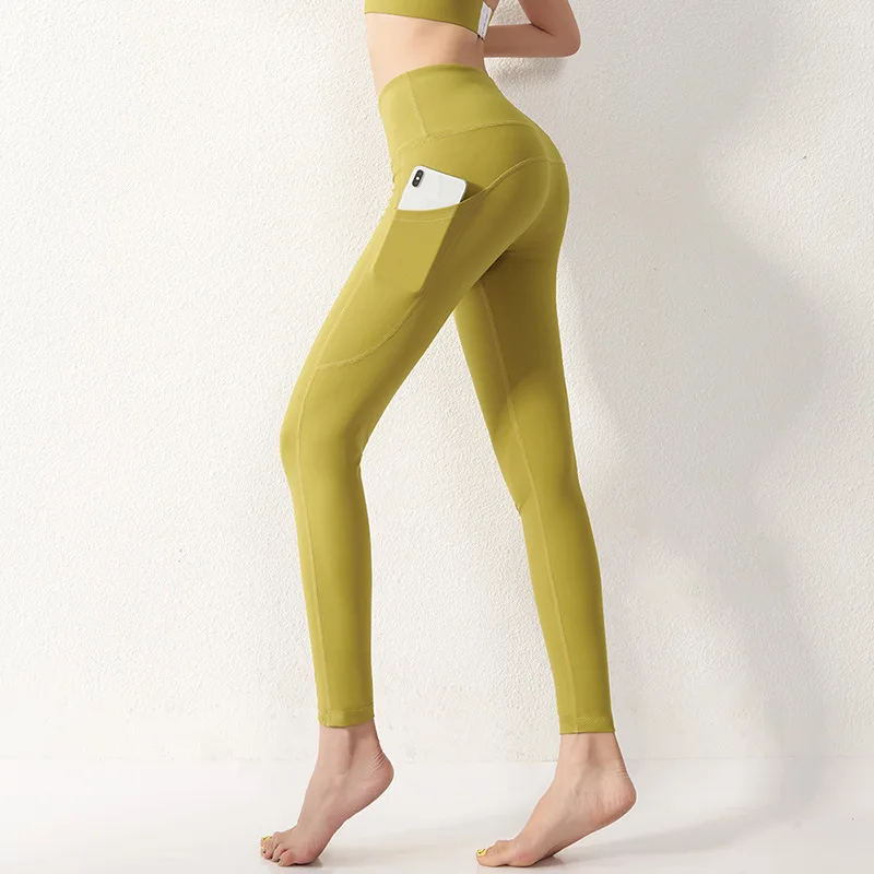 2022 European  American Yoga Pants Women's High Waist Hip Lifting Wearing Running Tight Sports Fitness Pants Women Yellow