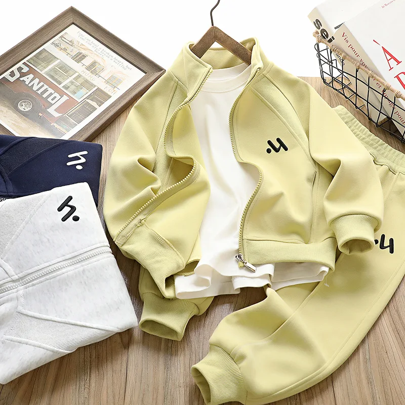 New spring collection of children's clothing: fashionable two-piece sets for boys and girls, including sweatshirts and sweatpant