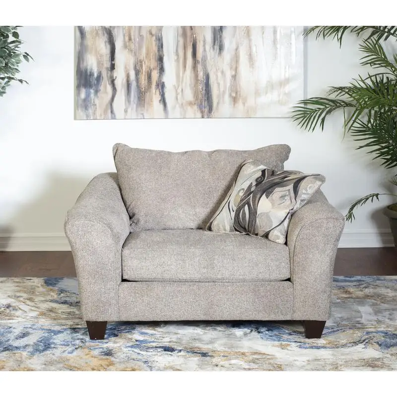 

Кресло с подушкой из серой ткани