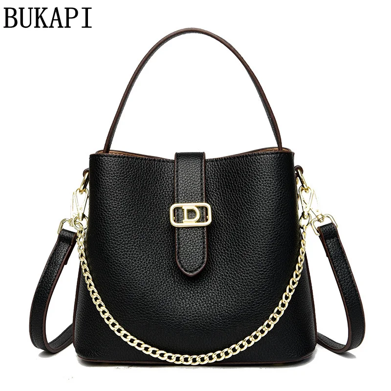 Double Magnetic buckle bag genuine cowhide women's shoulder bag  Street trendy bucket messenger bag  Trendy chain brand handbag