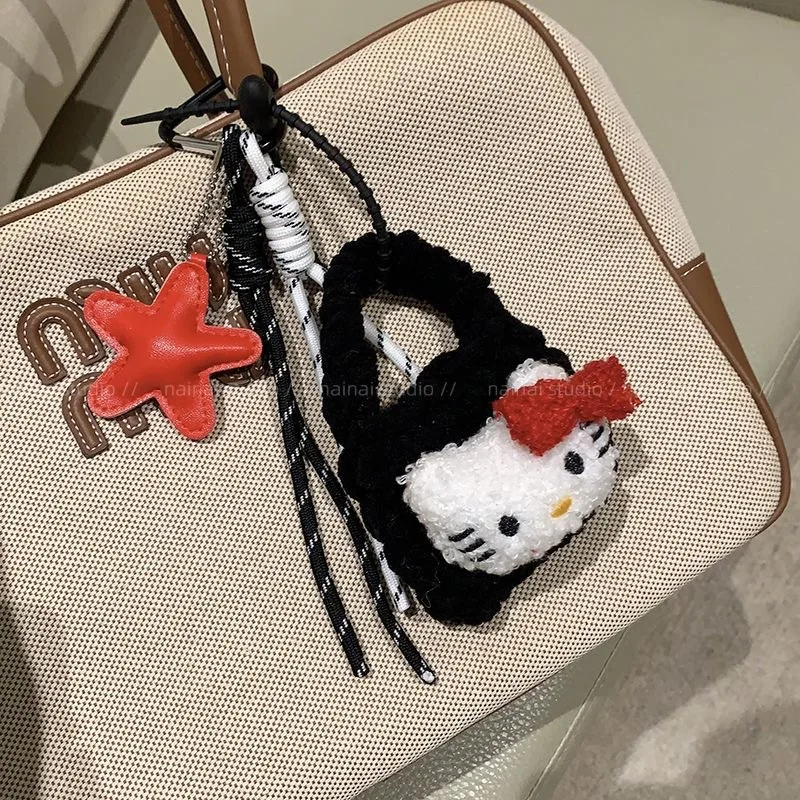 

Instagram-inspired Korean-style Hello Kitty coin purse Black leopard print KT Cat earphones storage pouch Lanyard pendant keycha