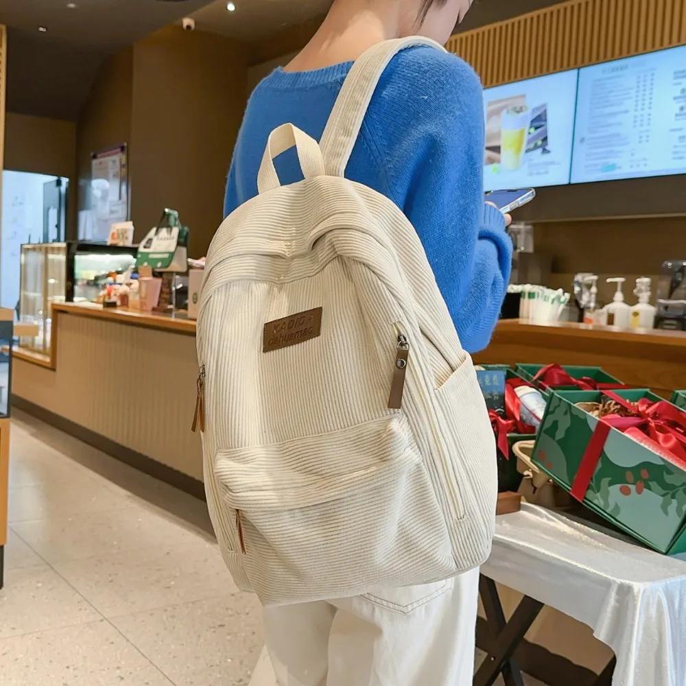 

New Women's Junior High School College Student Fashionable Men's Large Capacity Striped Fleece Backpack Is Multifunctional