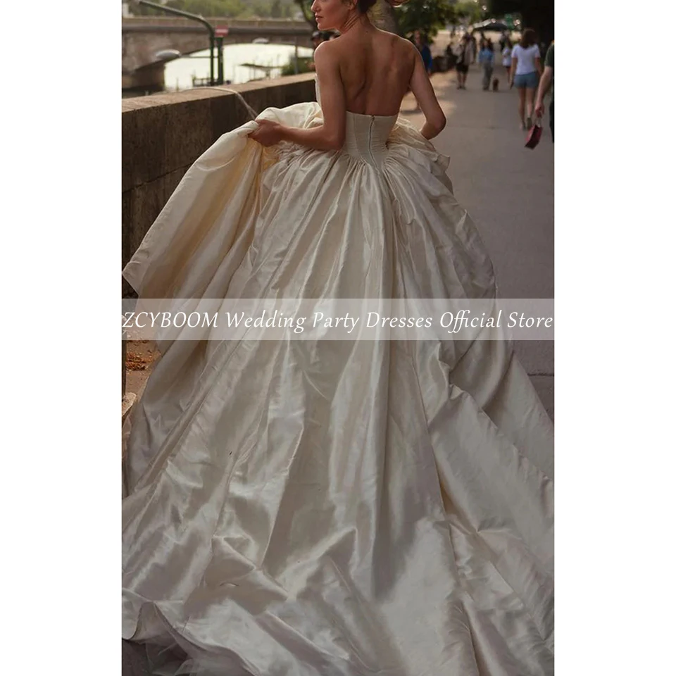 Elegancka suknia ślubna bez ramiączek i pleców w kolorze szampana na zamówienie, suknia balowa do ziemi z trenem zamiatającym, zapinana na zamek błyskawiczny, kolekcja 2025.