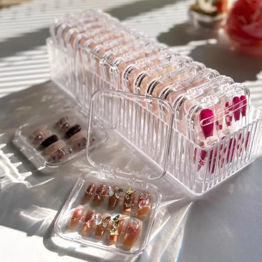 Pudełko do przechowywania 14 sztuk sztucznych paznokci z organizerem na paznokcie o długości 8,4 cm, zawiera 48 dwustronnych taśm kompaktowych.