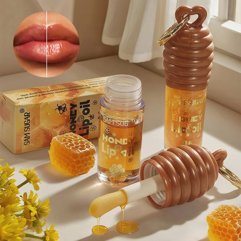 ลิปกลอสเนื้อฮันนี่ แบรนด์เอสเซนส์ ลิปบาล์ม บำรุงริมฝีปากให้ชุ่มชื้นยาวนาน ลดเลือนริ้วรอยริมฝีปาก พกพาสะดวก พร้อมพวงกุญแจ ลิปกลอสใส บำรุงริมฝีปาก
