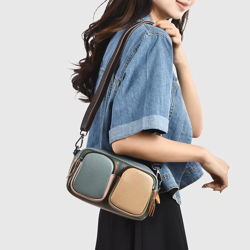 

Женская сумка на одно плечо большой вместимости с цветными блоками, воловьей кожей сверху и многофункциональной сумкой через плечо.