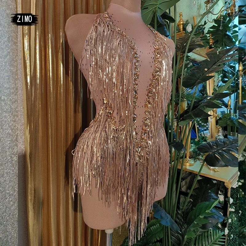Corsetti con frange e paillettes scintillanti con strass, costumi da discoteca per feste da donna, costumi da cantante e troupe da ballo indossati sul palco