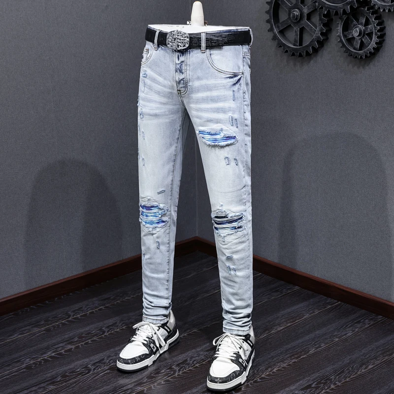 

American fashion new men's jeans washed nostalgic perforated blue leather patch light blue jeans hip-hop brand pants Y2K