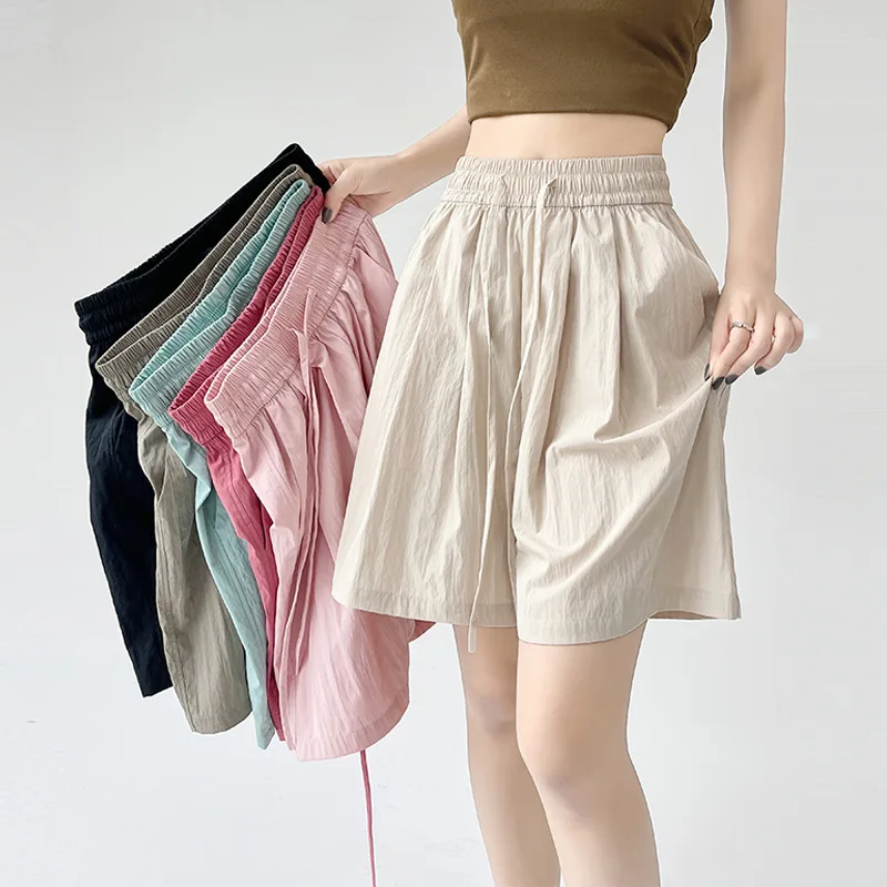 ฤดูร้อนผู้หญิงกางเกงขาสั้นสบายๆสองกระเป๋า Elastic เอวกางเกงขาสั้นเอวสูงหลวมกางเกงขาสั้นสําหรับสาวนุ่มหญิงกางเกงขาสั้นชายหาด