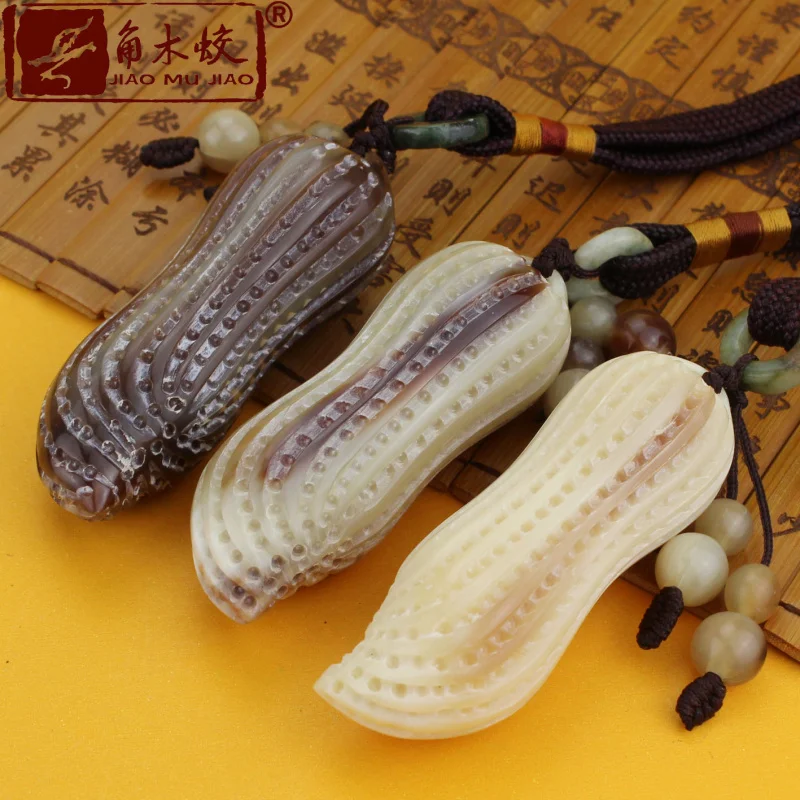 Carved pieces of hornwood and white yak horn with realistic designs