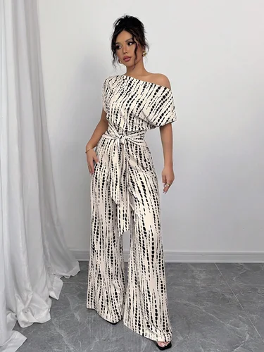 Mono a rayas europeo y americano, estilo de vacaciones de verano, mono con tirantes inclinados, pantalones de pierna ancha