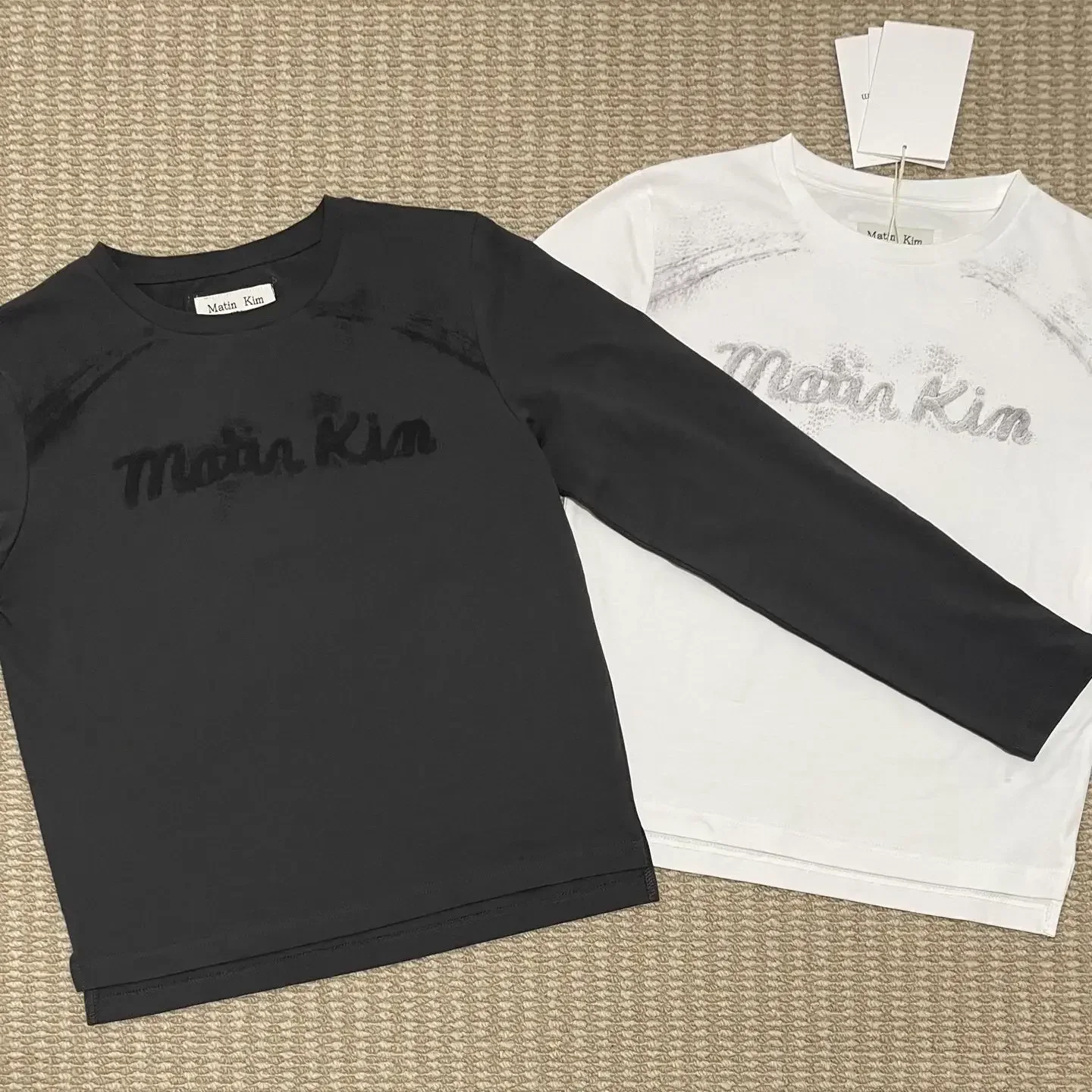 Matin Kim Pigment Graffiti Logo Long Sleeve Tee Slim Fit Crew Neck Unisex Korean