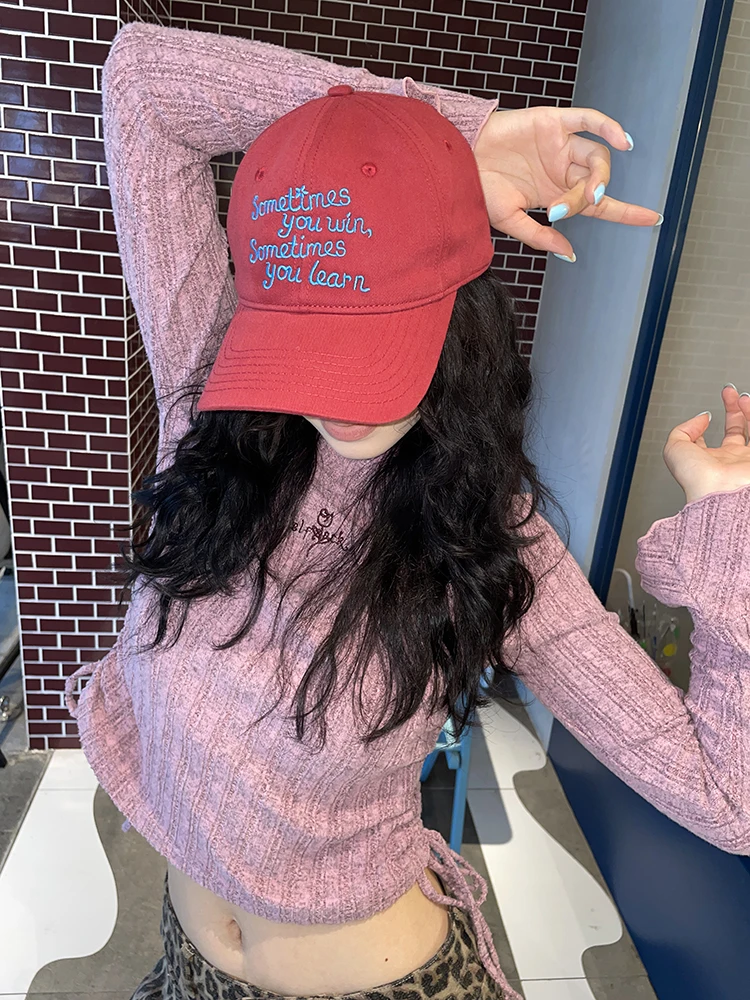 

ELFSACK 2025 Winter New Arrivals Cute Crocheted Tassels Red Ear-flap Hat For Woman