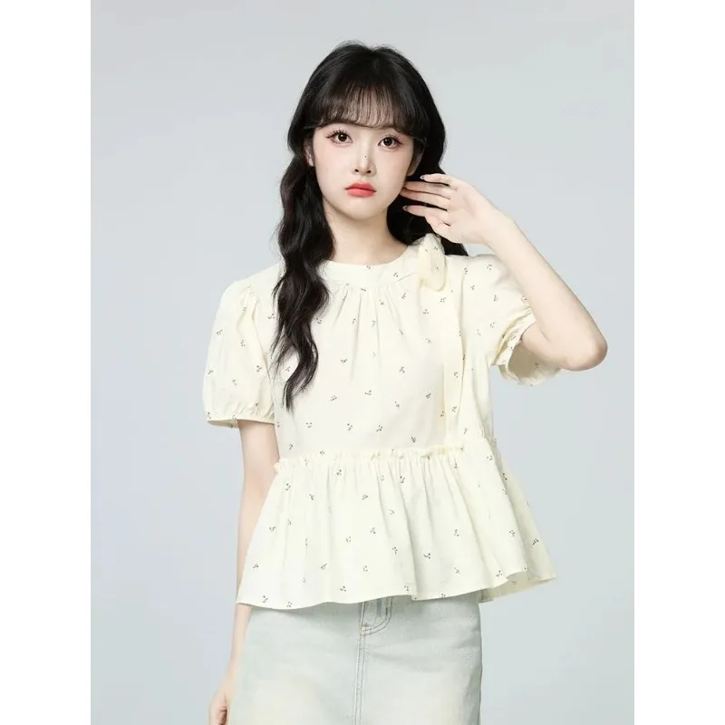 

Women's Cream Ditsy Floral Print Puff Sleeve Peplum Blouse with Ruffle Hem and Bow Detail