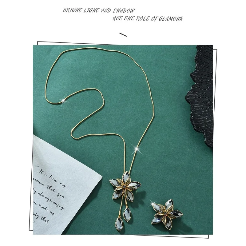 

High-end crystal flower sweater chain brooch, tassel long necklace, can be worn in two