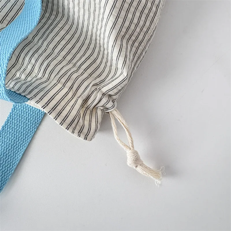 Drawstring striped handbag, souvenir bag, portable large capacity drawstring bag, travel makeup bag