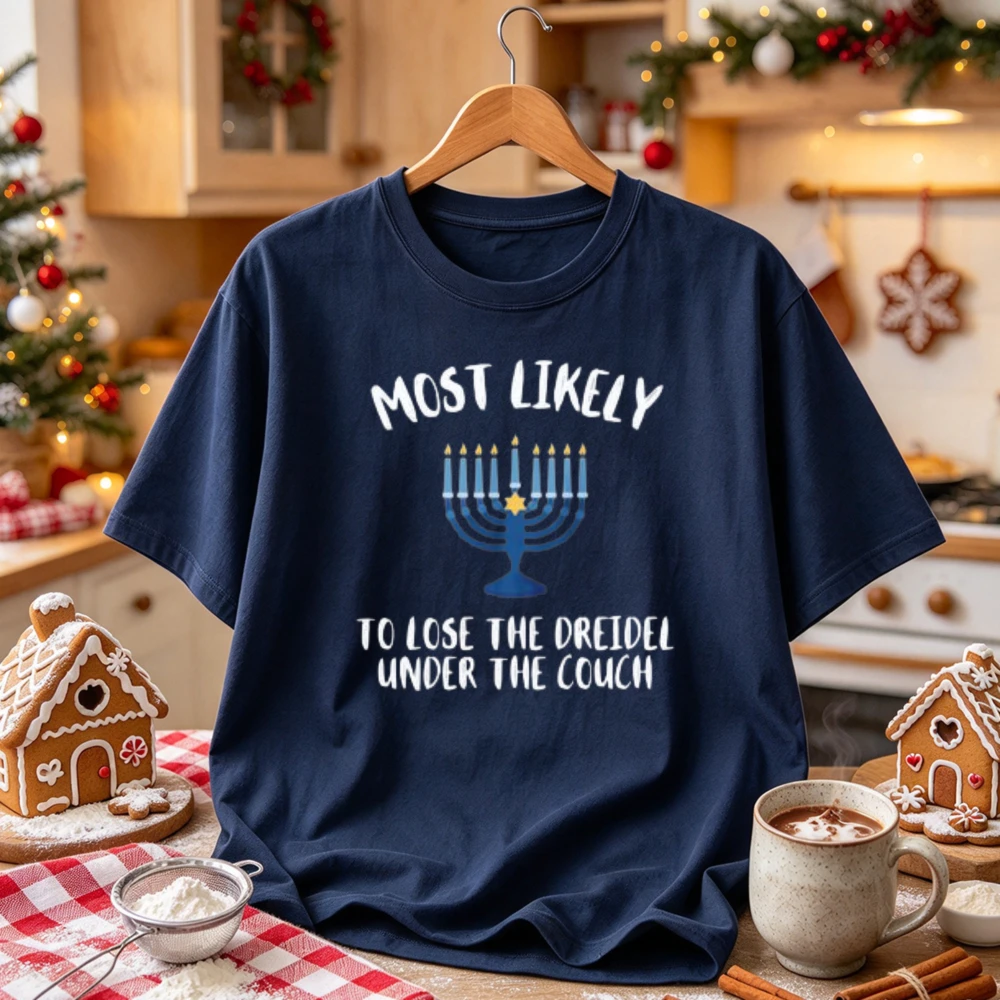 Most Likely To Lose The Dreidel Under The Couch Hanukkah Menorah Graphic Funny Slogan Jewish Festival of Lights Holiday T-Shirt