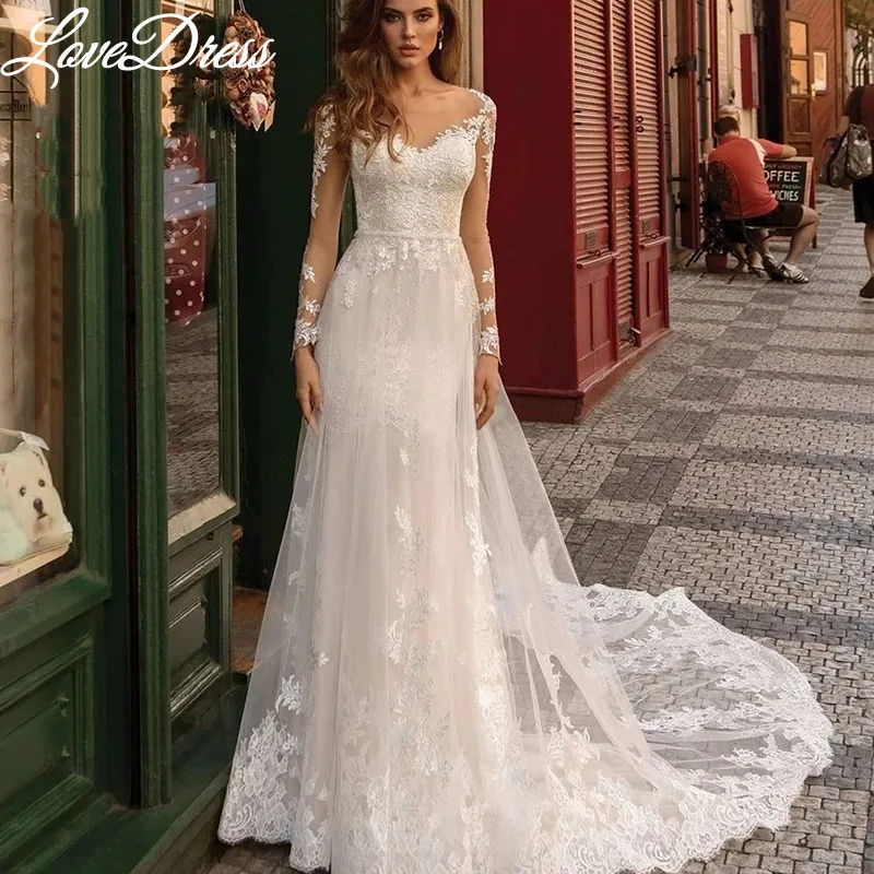 

Beach Sheer Neck Wedding Dress Long Lace Applqiues Sleeve Illusion Backless Modern Button Bride Gown Court Train Robe De Mariée